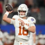 texas-quarterback-arch-manning-warms-96523669_e2a6a3