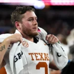 Texas-Longhorns-quarterback-Quinn-Ewers-3-looks-into-the-crowd-after-the-28-14-loss-to-Ohio-State-in-the-College-Football-Playoff-semifinal-game